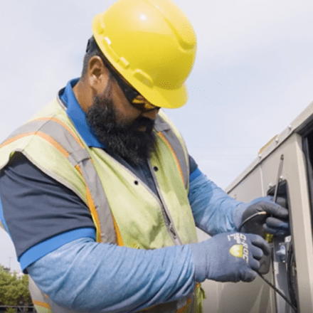 man repairing HVAC