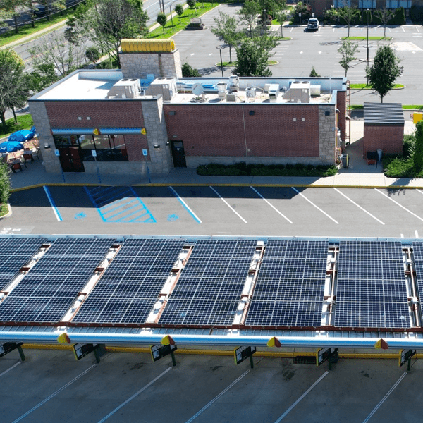 Solar panels on top of a Sonic fast food restaurant.