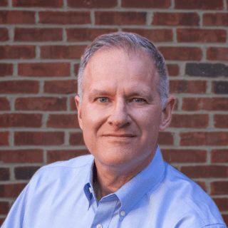 Headshot of Dennis Maloney.