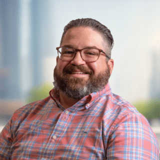 Headshot of Eric Jadach, Director of Account Management at Budderfly.