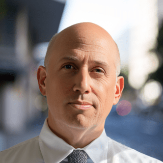 Headshot of Ken Fassman, Director of Product Management at Budderfly.