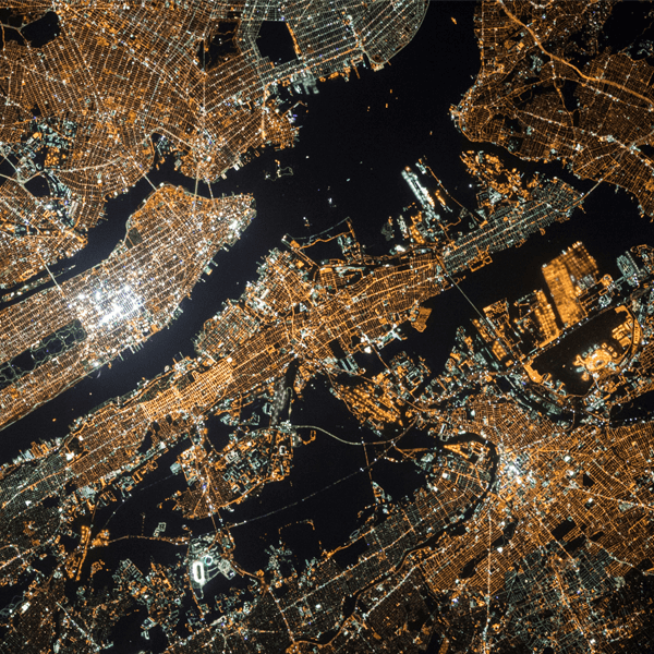 Aerial view of a large electic grid at night.